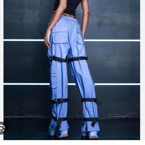 DOLLS KILL POSTER GIRL PURPLE & BLACK STRAP CARGO PANTS SOLD OUT ONLINE